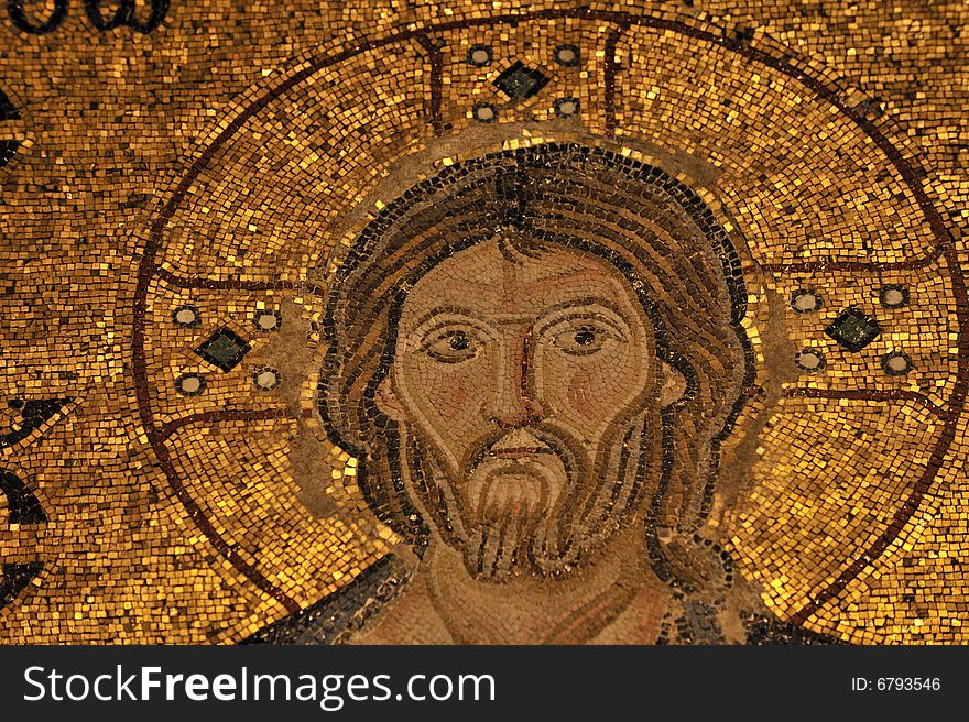 The Empress Zoe mosaics on the eastern wall of the southern gallery date from the 11th century. Christ Pantocrator, clad in the dark blue robe (as always the custom in Byzantine art), is seated in the middle against a golden background, giving His blessing with the right hand and holding the Bible in His left hand. (. The Empress Zoe mosaics on the eastern wall of the southern gallery date from the 11th century. Christ Pantocrator, clad in the dark blue robe (as always the custom in Byzantine art), is seated in the middle against a golden background, giving His blessing with the right hand and holding the Bible in His left hand. (