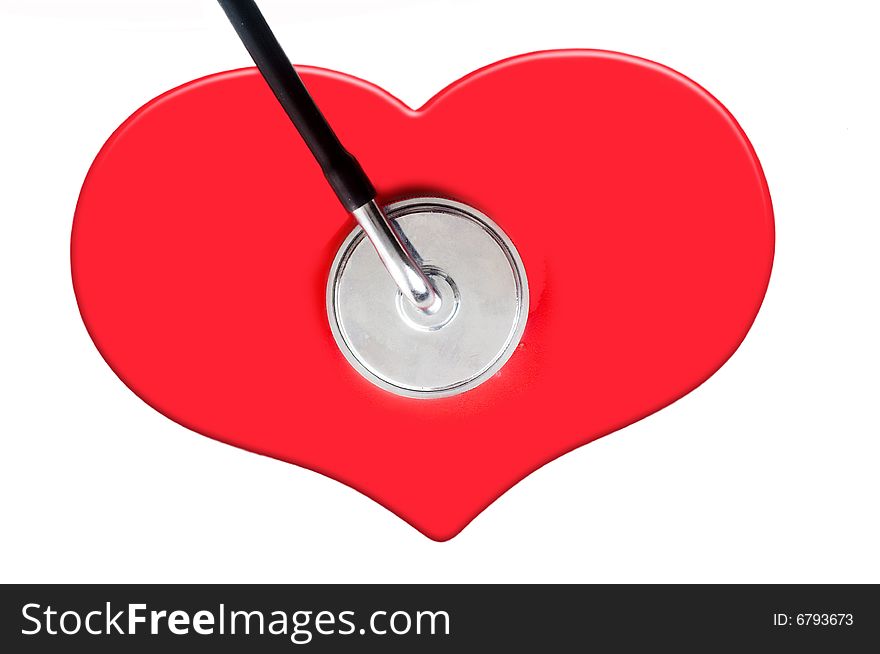Red heart shape and Stethoscope set against white background