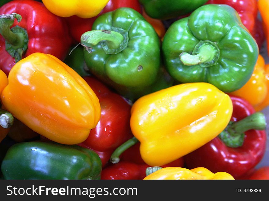 Assortment of Peppers in a variety of colours, picture taken in a rural fruit and vegetables market in Singapore. Assortment of Peppers in a variety of colours, picture taken in a rural fruit and vegetables market in Singapore