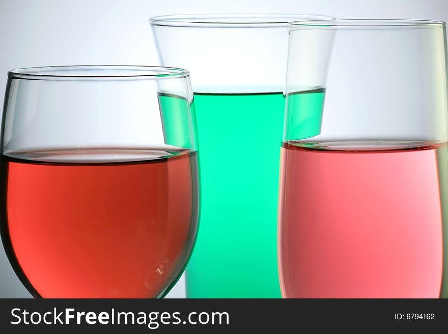 Glass with Colorful Juice on White Background