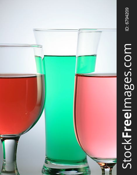 Colorful Juice with Glass on White Background