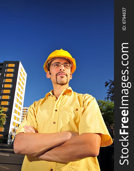 Young architect over blue sky