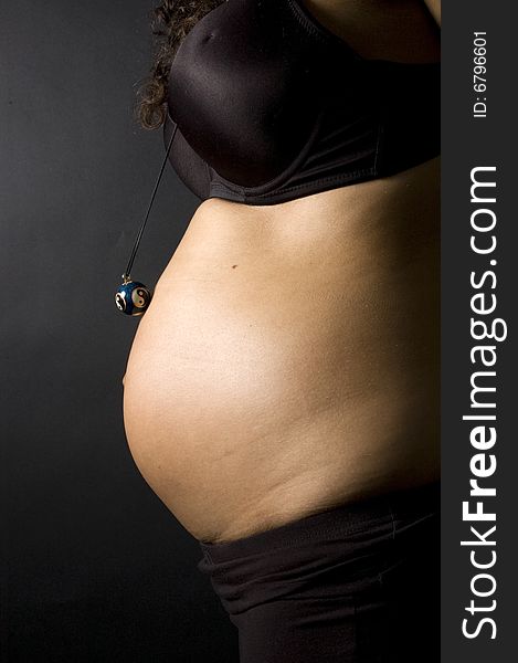 30 weeks pregnant teenager on black