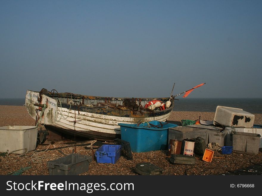 Old fishing boat left on the beach