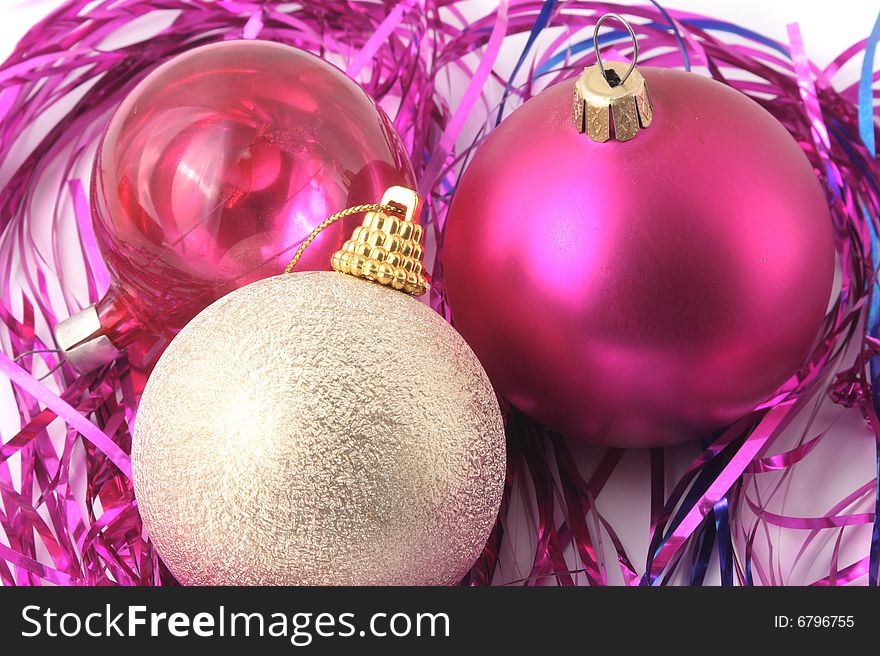 Christmas-tree decorations of different color and tinsel.