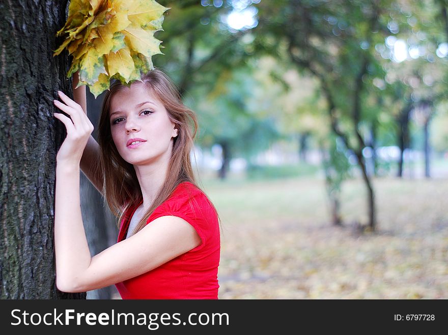 Woman With Yellow  Leaves