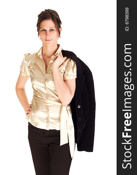 Young attractive Caucasian business woman with jacket slung over her shoulder