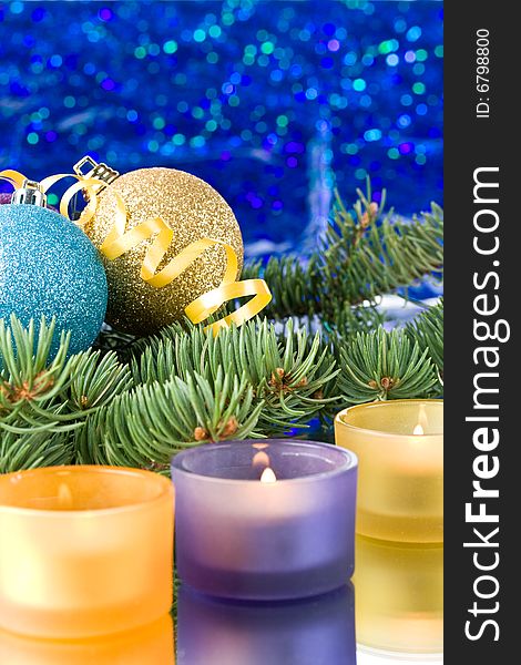 Decoration with an  firtree branch, candles and toys. Decoration with an  firtree branch, candles and toys