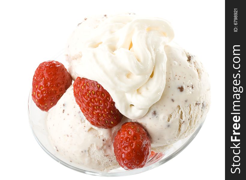 Ice-cream with a strawberries in a glass on a white background.