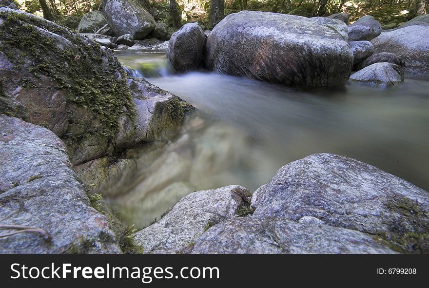 Water in Motion.
Slow shutter speed exposure of flowing water in River Vecchio high-up in the Mountains on Corsica, France