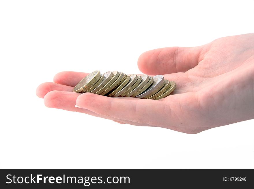An Isolated image of Euro Coins in a hand. An Isolated image of Euro Coins in a hand