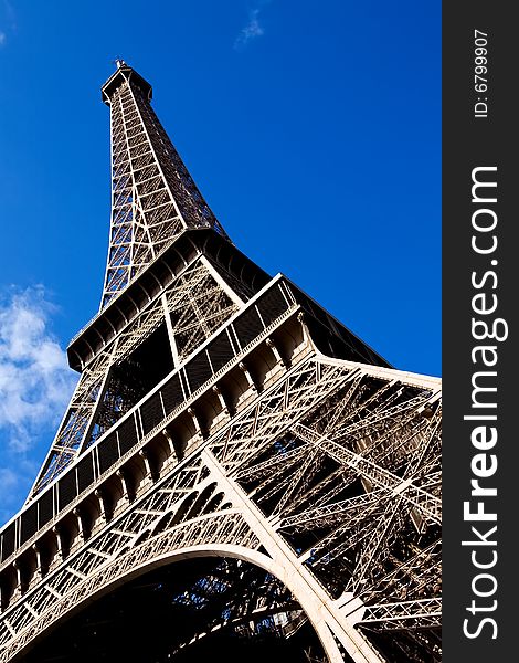 Classical beautiful view of The Eiffel Tower in Paris on a sunny day