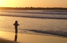 Girl Jumping At Zurriola S Beach. San Sebastian Royalty Free Stock Images