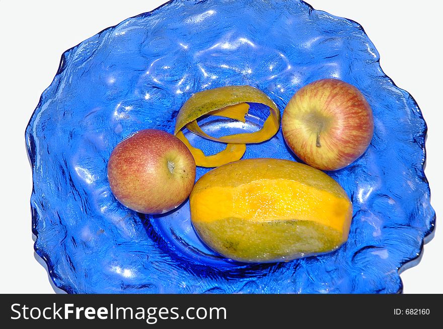 Fresh and healthy fruit for a salad, tropical mango from Guinea Bissau and apples. Fresh and healthy fruit for a salad, tropical mango from Guinea Bissau and apples.