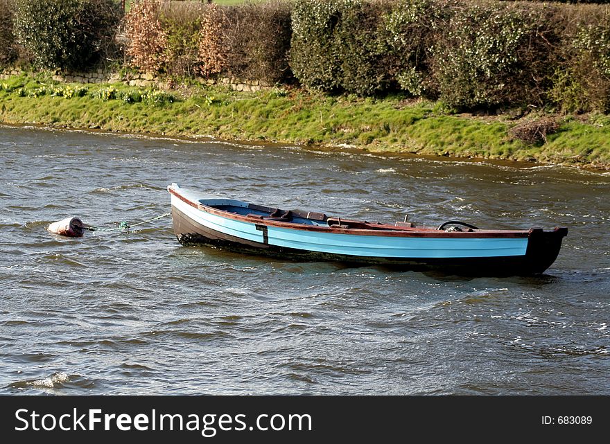 Fishing boat moored on a lake