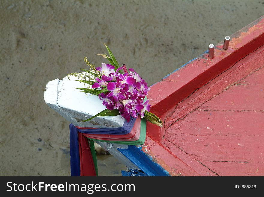 Orchids on a wooden fishing boat in Bang Sare, Chonburi province, Thailand