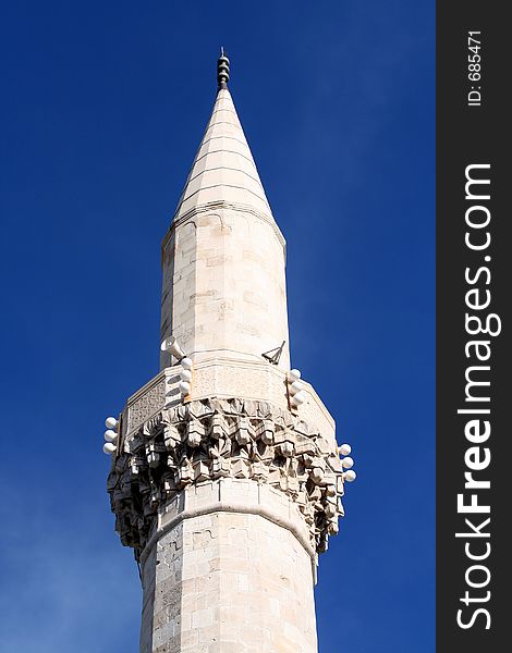 Minaret under the blue sky