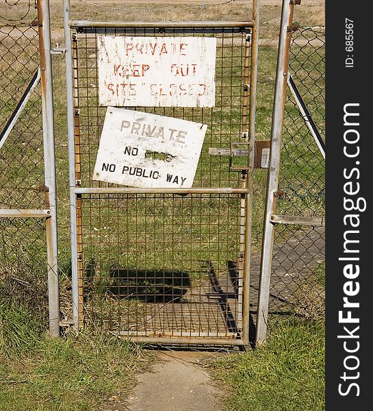 Private keep out sign on wire gate.