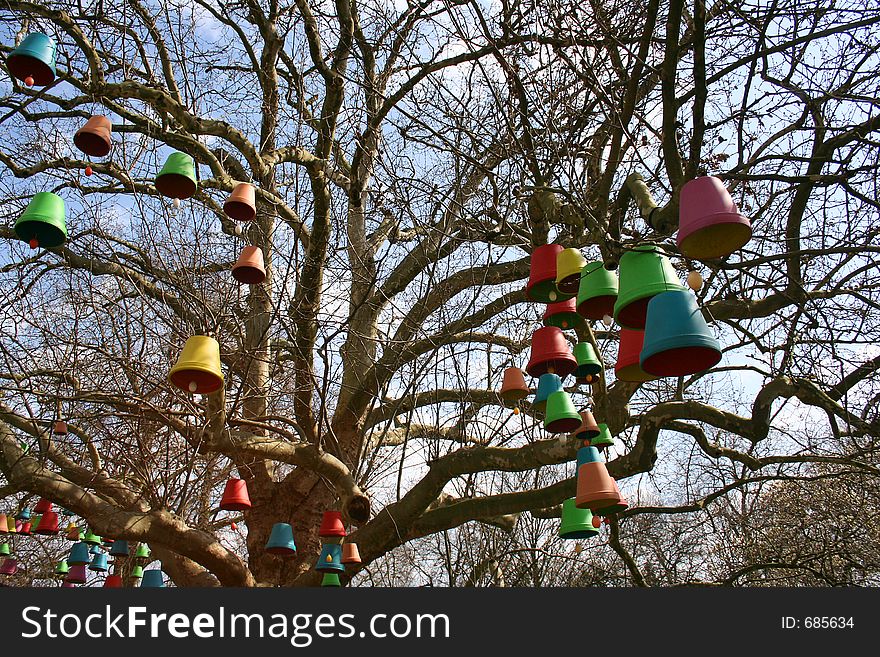 Easter clocks hanging in a tree