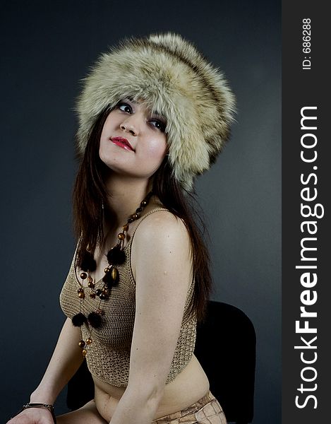 Young woman in big fur russian hat. Young woman in big fur russian hat