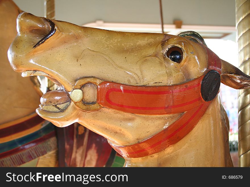 A close-up of a carousel horse head