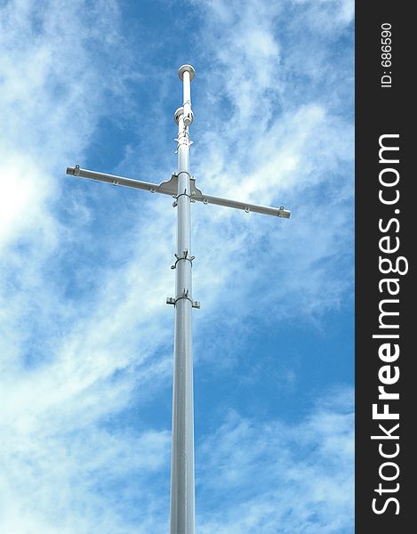 Flag pole under blue sky