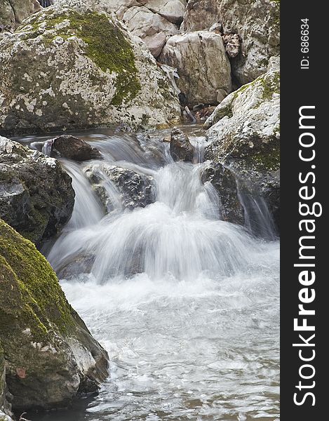 River between rocks. River between rocks