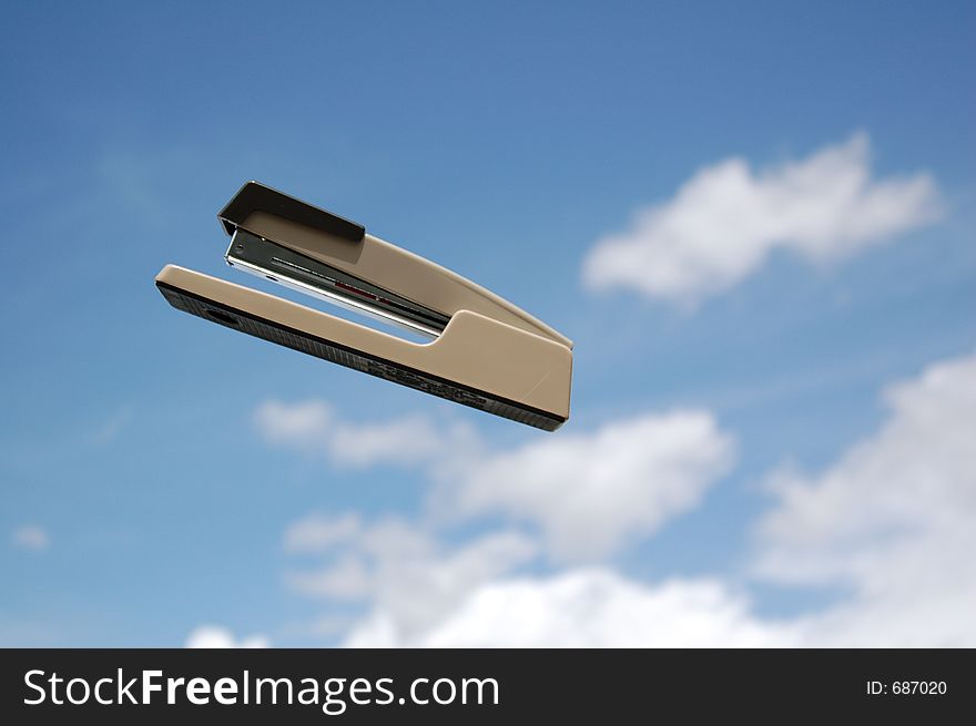 Stapler suspended in the air. Stapler suspended in the air
