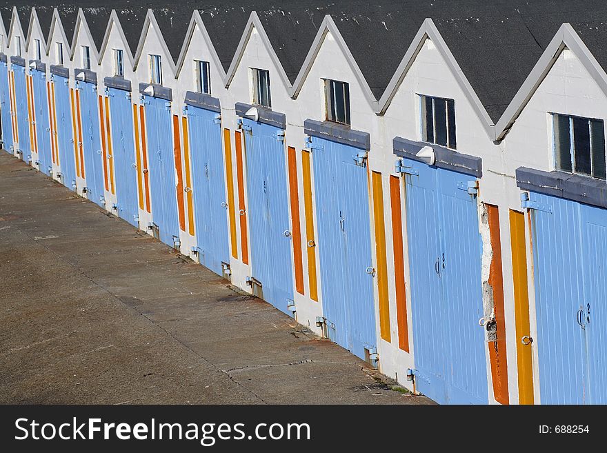 A row of almost identical boatsheds at the marina. A row of almost identical boatsheds at the marina