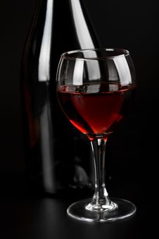 Glass Of Red Wine And Bottle Stock Photo Glass Of Red Wine And Bottle Stock Photo