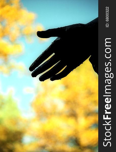 Hand On The Autumn Background