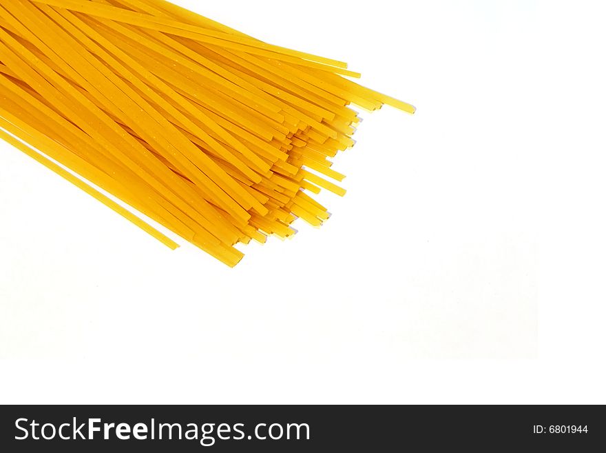 Close up shot of yellow tagliatelle pasta