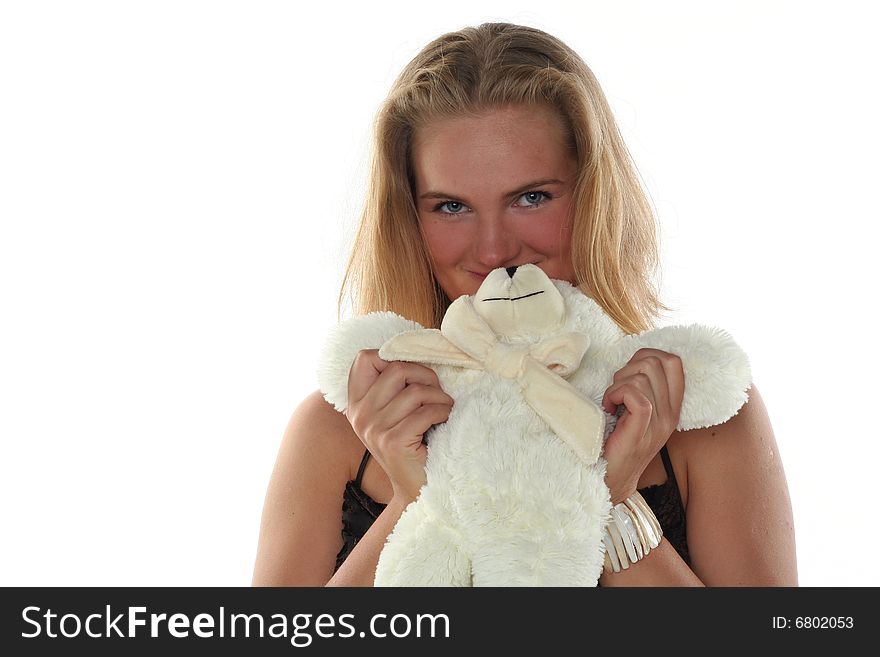 Blond beautiful woman and teddy bear