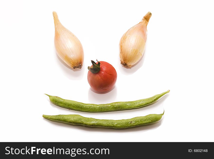 Smiling vegetables isolated on white