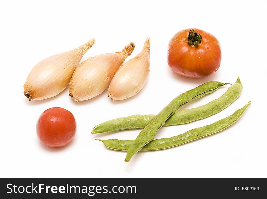 Isolated colored vegetables on white. Isolated colored vegetables on white