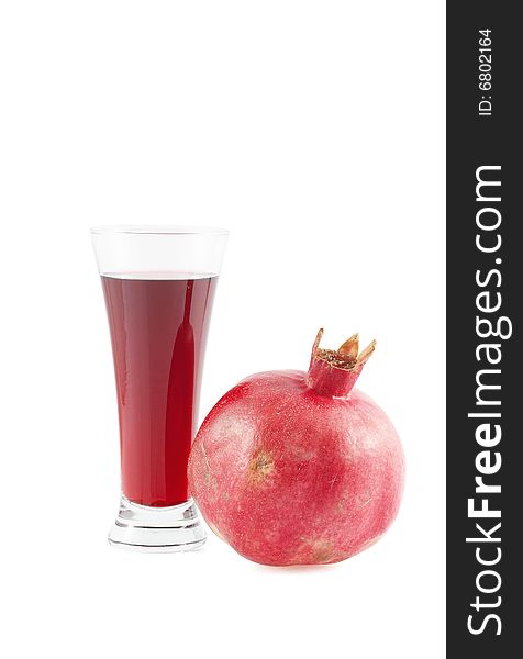 Glass Of Garnet Juice And Pomegranate Fruit.