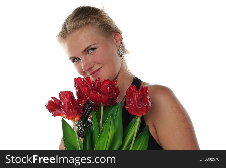 Woman with tulips and revolver isolated on white background