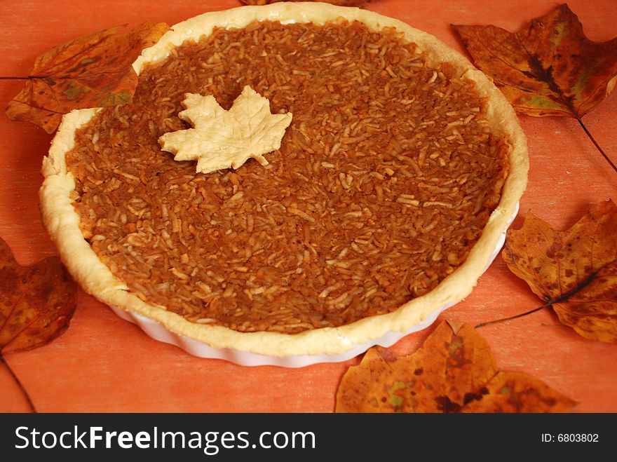 Apple pie with a autumn decor. Apple pie with a autumn decor