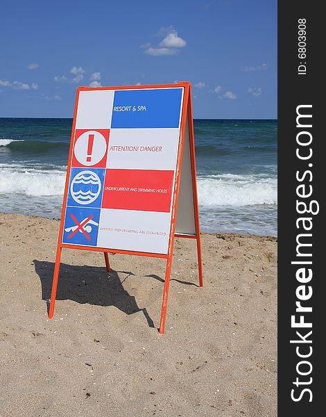 Sign Attention! Danger on the beach. Sign Attention! Danger on the beach.