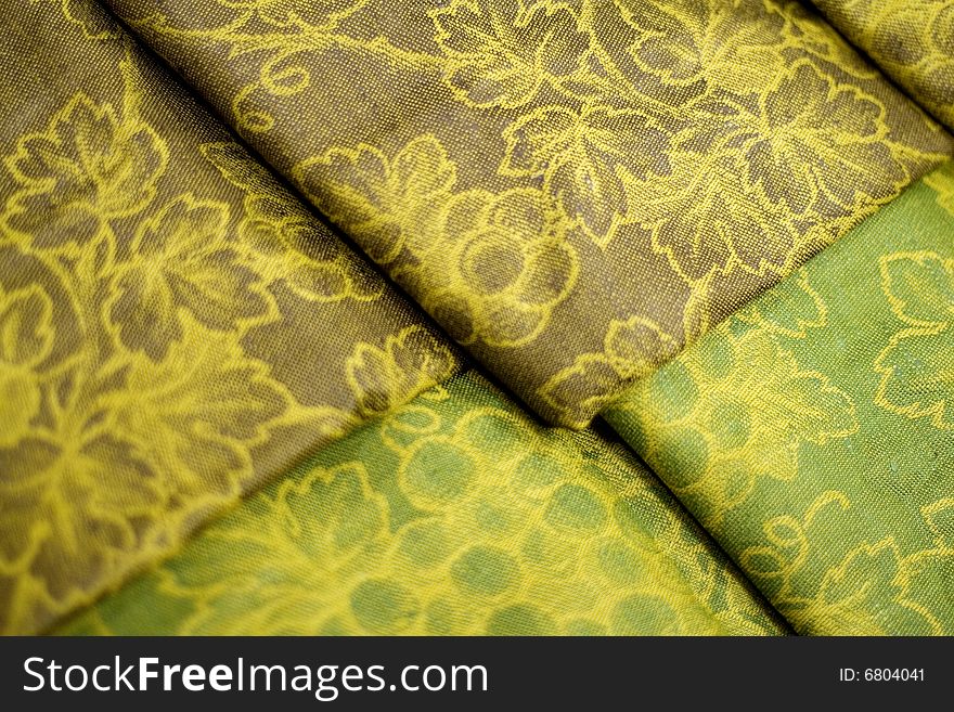 Green textile background close up