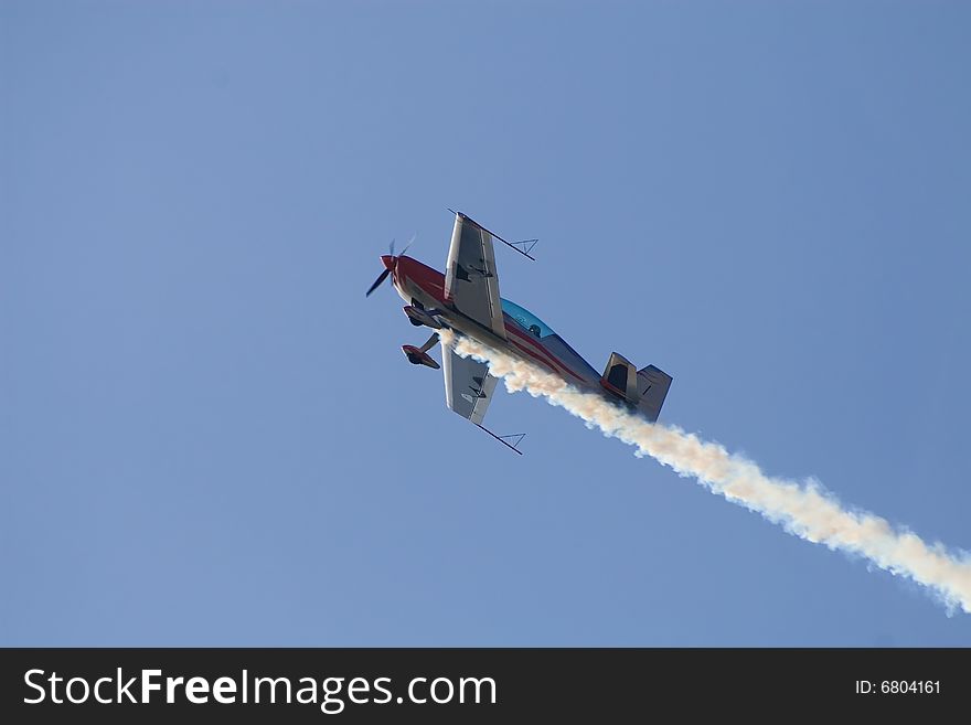 Airplane in the blue sky