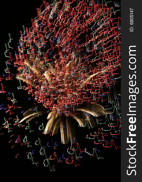 Time lapse image of fireworks that shows letters of the alphabet in cursive. Time lapse image of fireworks that shows letters of the alphabet in cursive.