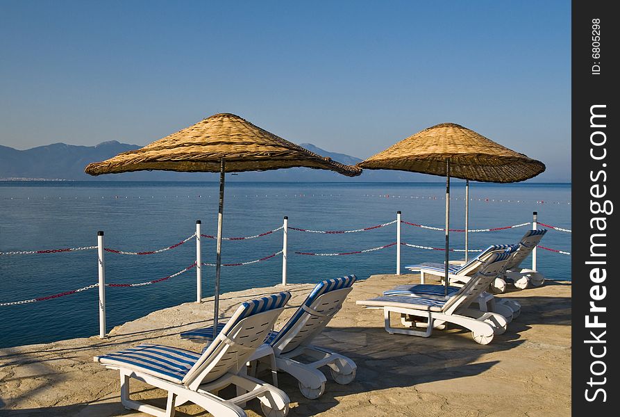 Sunshades in Turkish resort in the Aegean sea