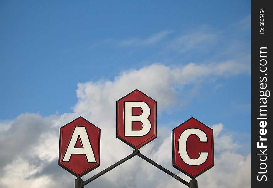 Red a b c sign and blue sky