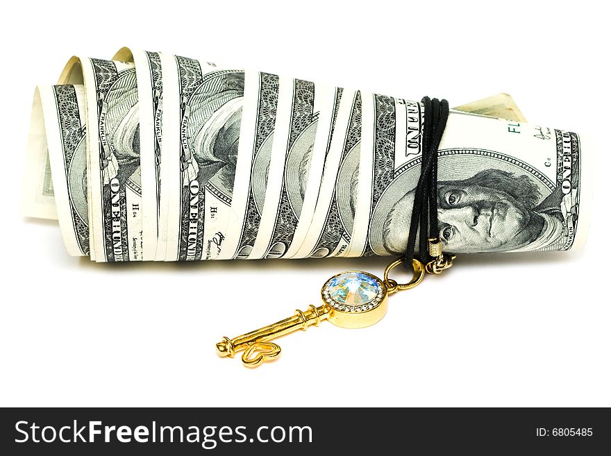 Golden key and dollars isolated on white
