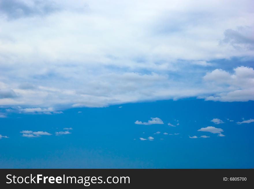 Horizontal clouds moving across a nice blue sky. Horizontal clouds moving across a nice blue sky