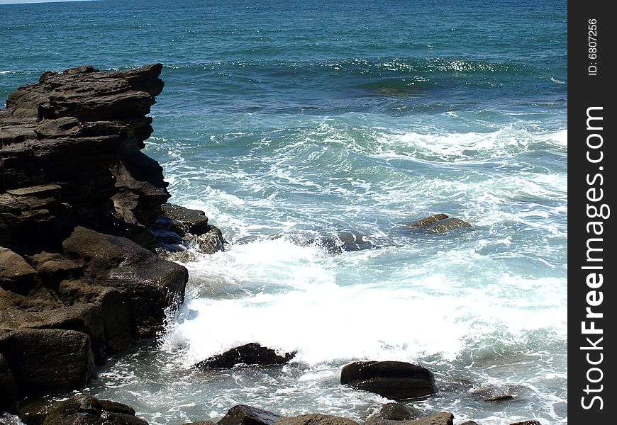 Cliff In The Sea