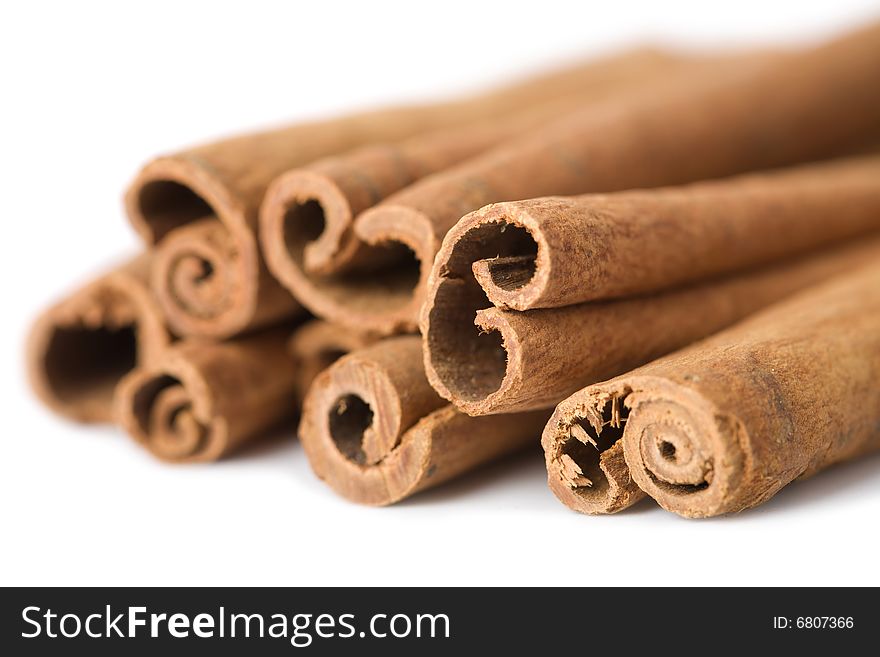 Heap of cinnamon sticks isolated. Heap of cinnamon sticks isolated