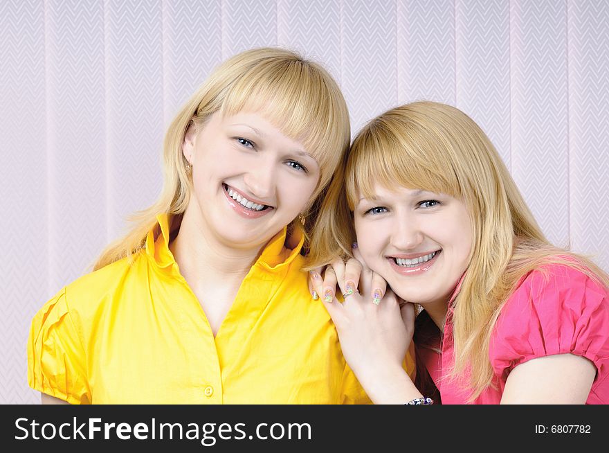 Portrait of two attractive blond sisters. Portrait of two attractive blond sisters
