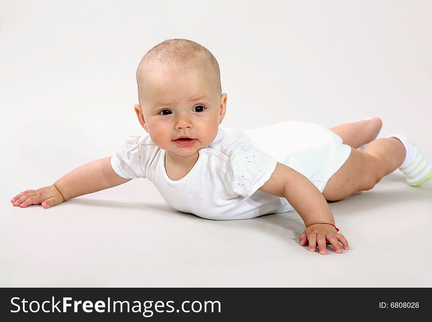 An image of a little baby in studio. An image of a little baby in studio